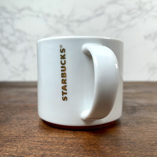 Starbucks 2012 Coffee Tea Mug Cup 16 oz / 473 ml Porcelain White w/ Gold Writing