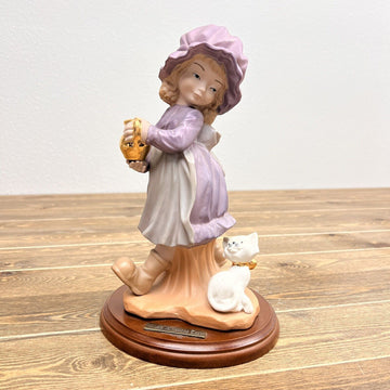 Girl and her Kitten Porcelain Figurine on Wooden Base Signed by P. TURIS