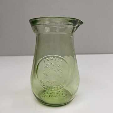 Kendall Farms green glass Flowers vase. 6 1/2” tall