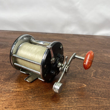 Vintage Penn Leveline 350 Baitcast Reel with Orange Red Handle