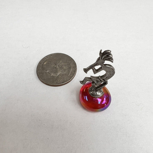 Miniature Silvertone Kokopelli Dancer on Iridescent Red Rock Figurine