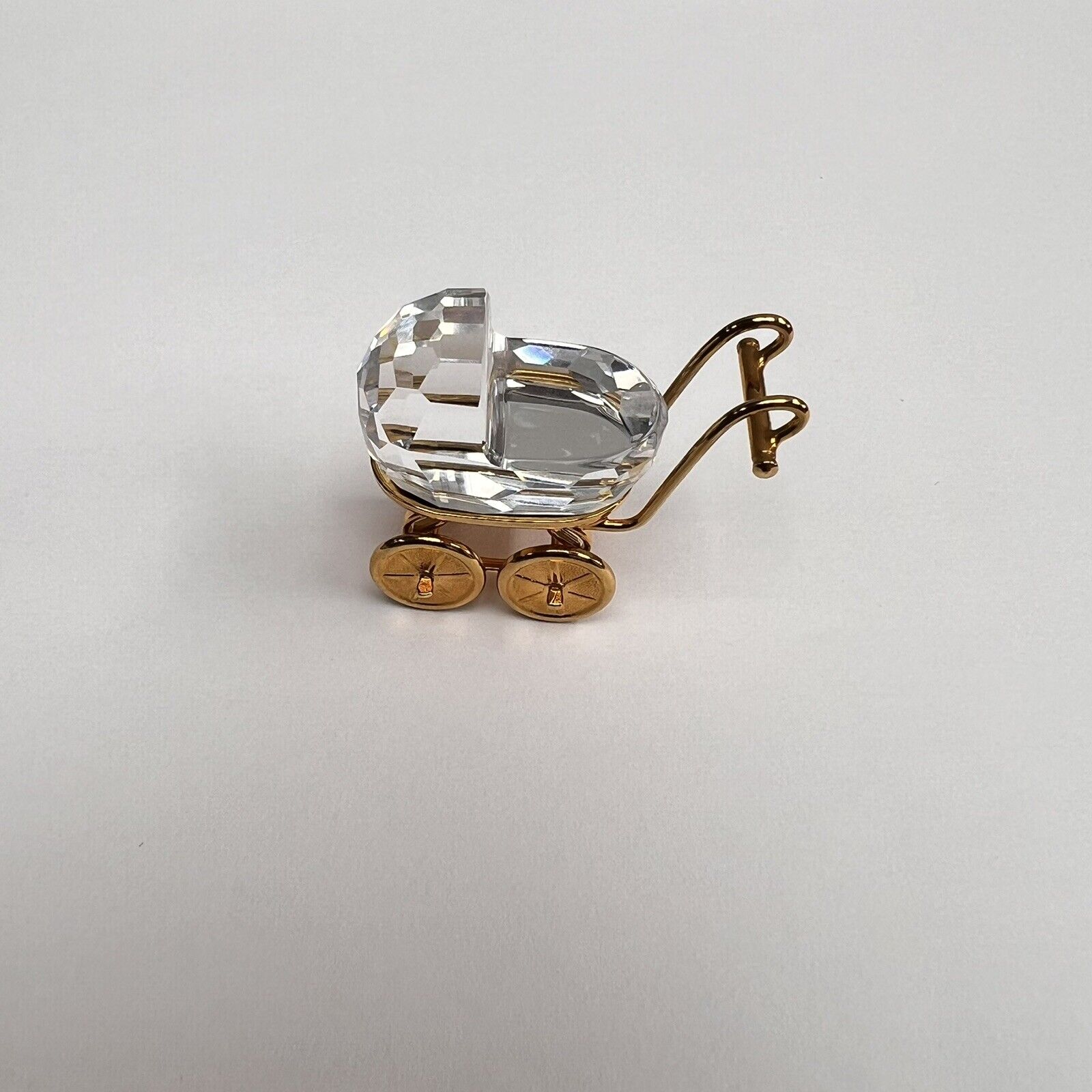 Swarovski Crystal Memories Retired Baby Stroller Figurine with Gold Accents