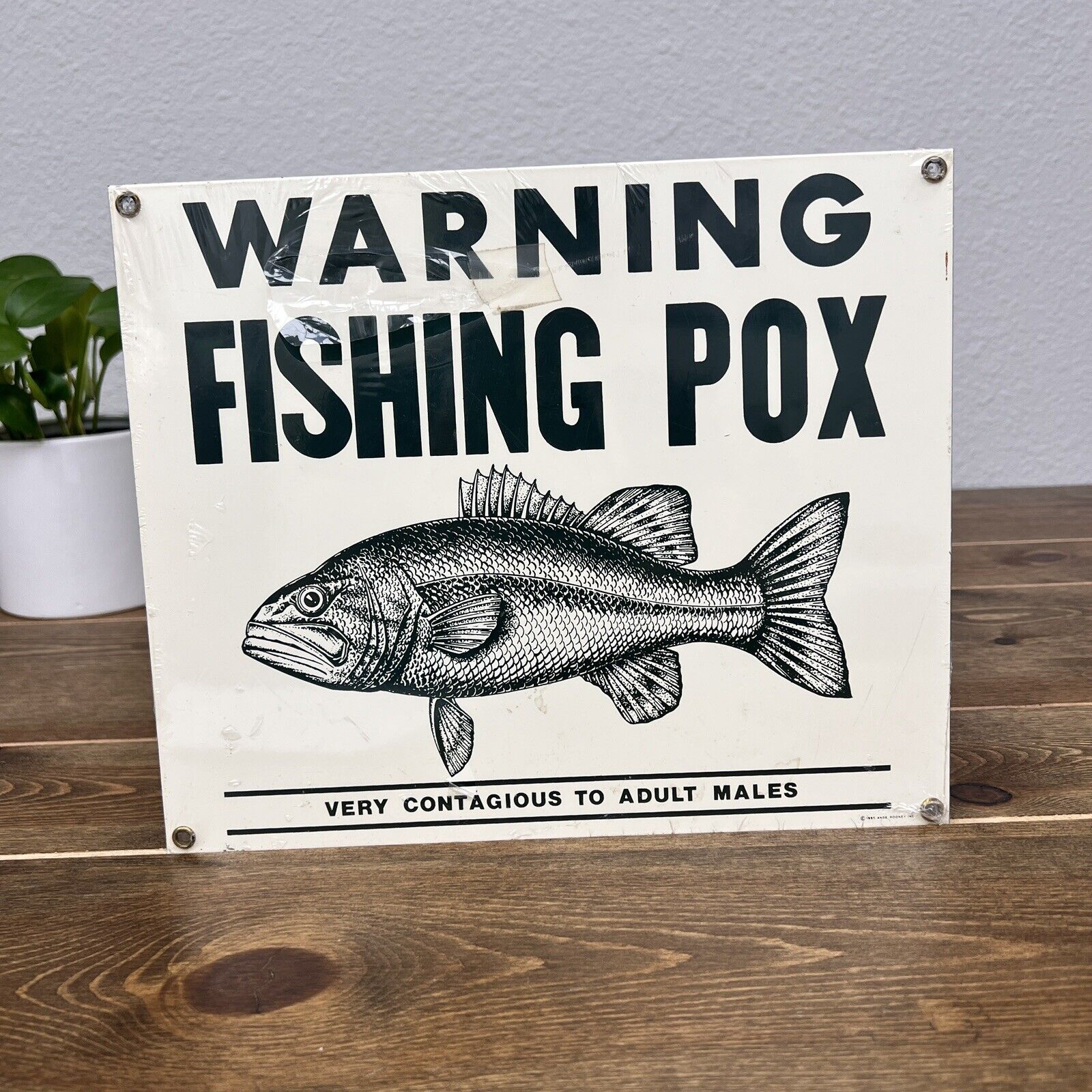 Ande Rooney Metal Sign Warning Fishing Pox 1995 Made In USA