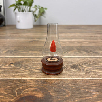 Oil Lamp Perfume Bottle w/ red plastic flame Vintage