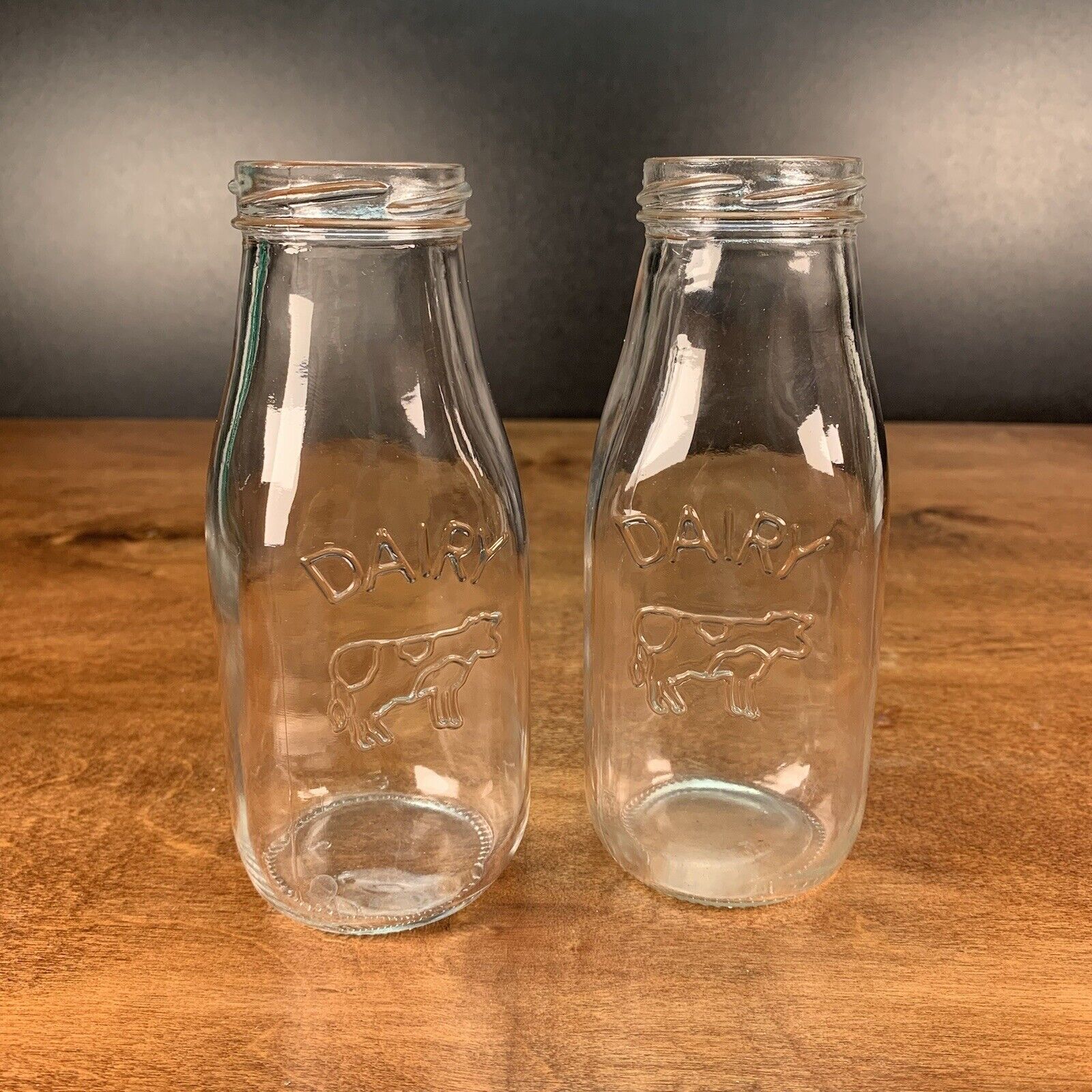 Set of 2 Dairy Half Pint Empty Bottles Raised Lettering with Cow Graphic